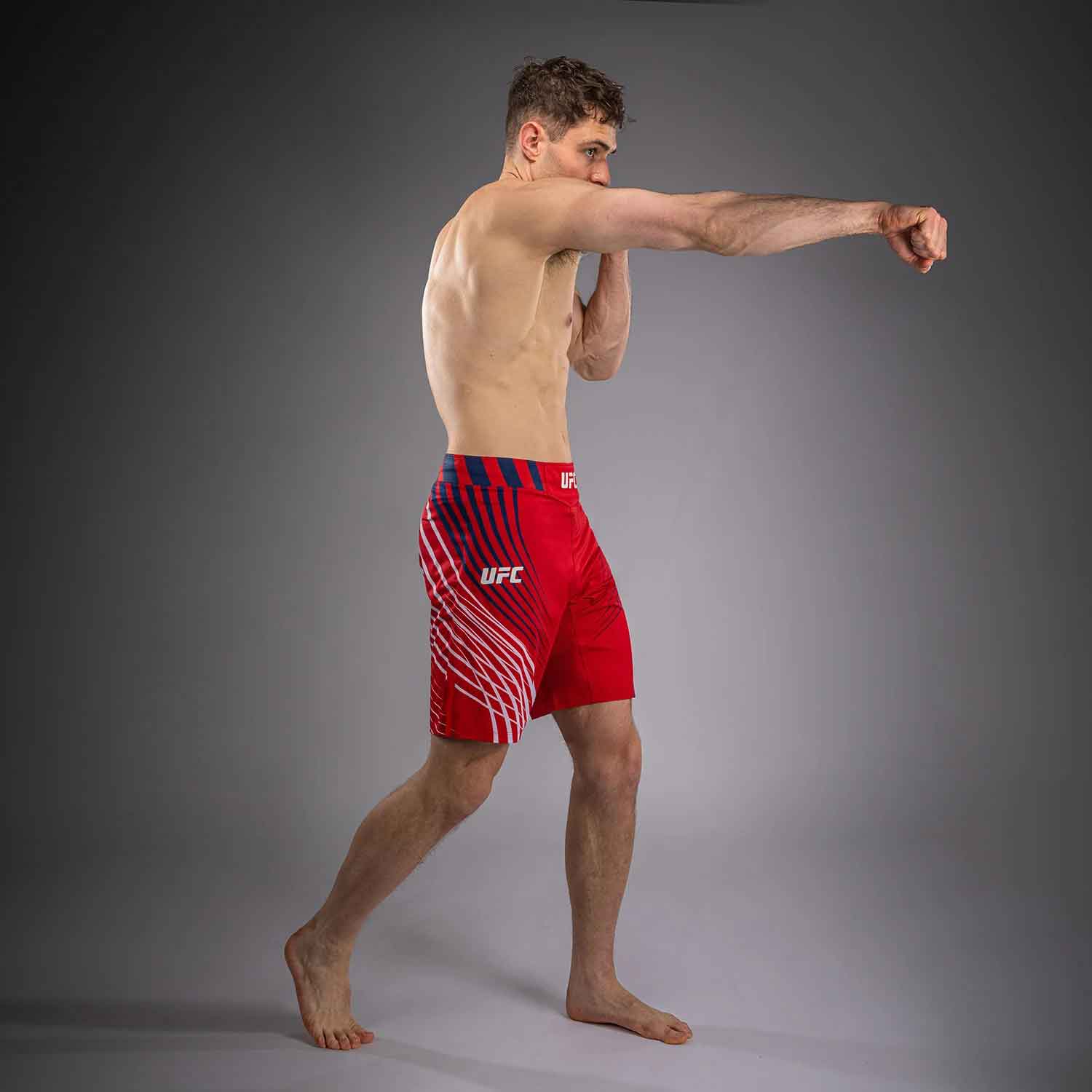 VENUM／ヴェナム　ファイトショーツ　　Official UFC Freedom 250 by Venum Authentic Fight Night Men's Red Long Fit Short／オフィシャル UFC フリーダム 250 by ヴェナム オーセンティック ファイトナイト メンズ ロングフィット ファイトショーツ（レッド）