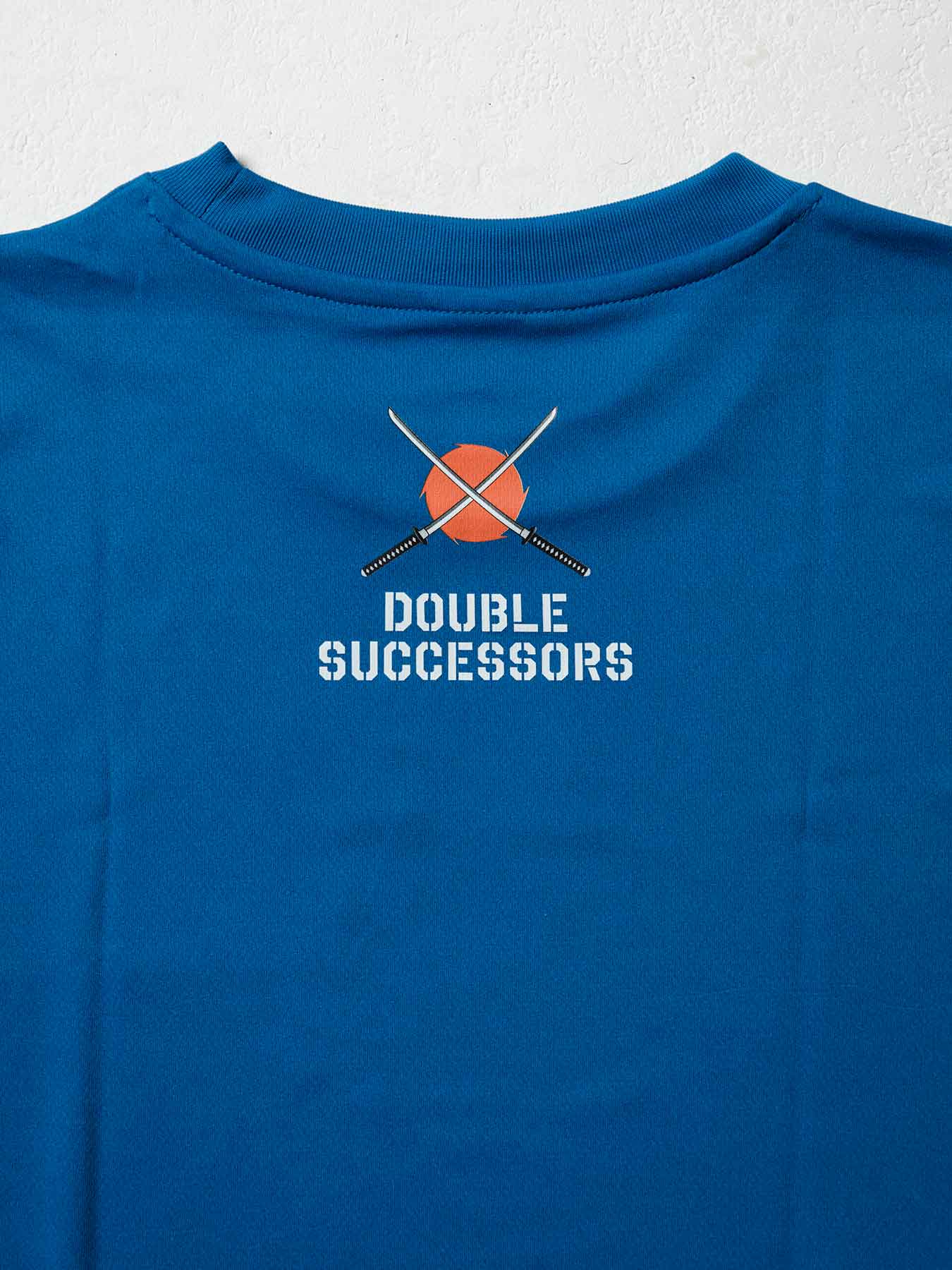 Tri-Fight／トライファイト　　YUTAKA SAITO & MASAKATSU UEDA「DOUBLE SUCCESSORS」DRY-FIT T-SHIRT／斎藤裕 & 上田将勝「ダブル・サクセサース」ドライフィットTシャツ（ユタカブルー）