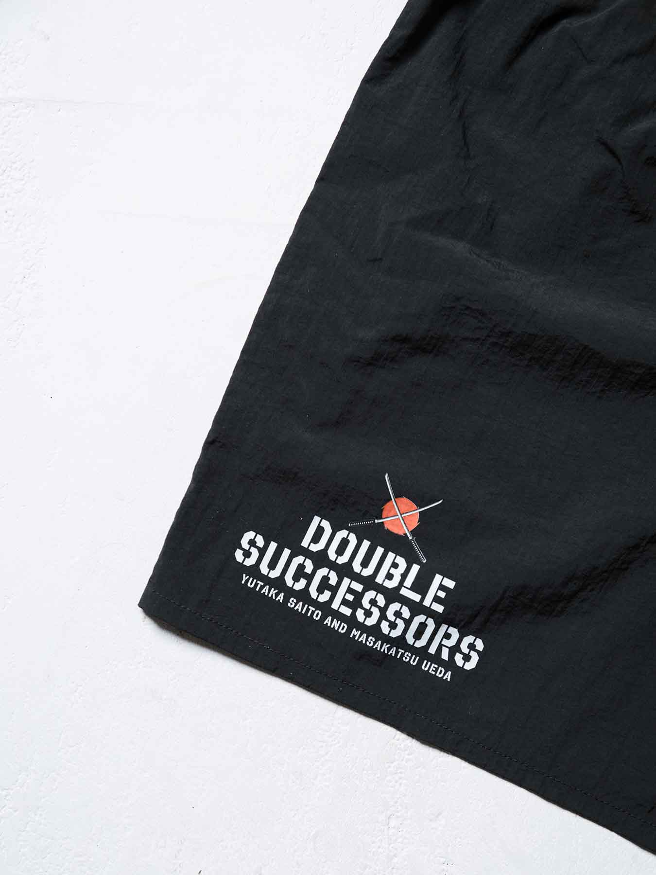 Tri-Fight／トライファイト　　YUTAKA SAITO & MASAKATSU UEDA「DOUBLE SUCCESSORS」SHORTS／斎藤裕 & 上田将勝「ダブル・サクセサース」ショーツ（黒）