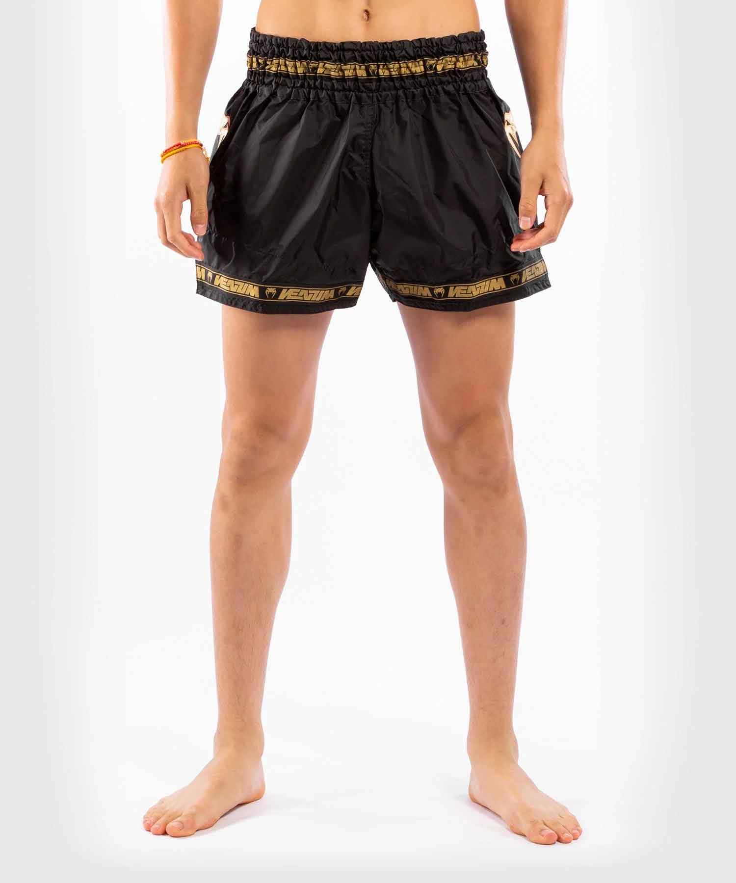 PARACHUTE MUAY THAI SHORTS／パラシュート ムエタイショーツ（黒／ゴールド）