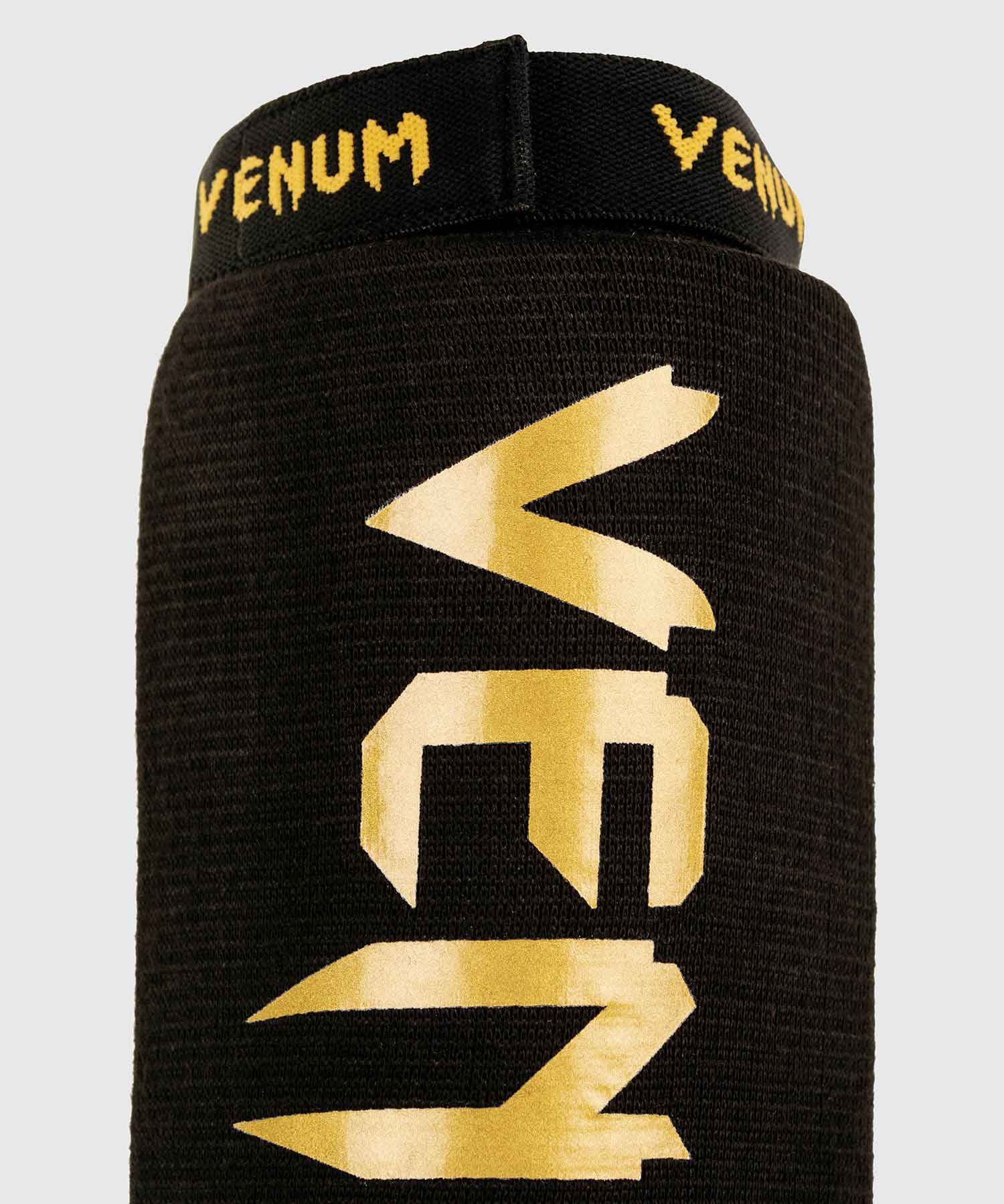 VENUM／ヴェナム　アクセサリー　　KONTACT SHIN GUARDS／コンタクト シンガード（黒／ゴールド）